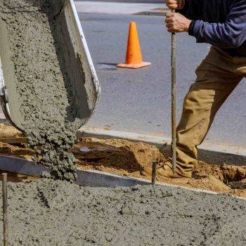 Photo of a team member from Ballarat Pro Concreters pouring a concrete driveway in Redan, Ballarat.