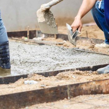 Image is of a concreter in Ballarat working on a slab